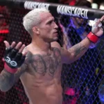 Charles Oliveira of Brazil celebrates his TKO victory over Beneil Dariush during the UFC 289 event at Rogers Arena.