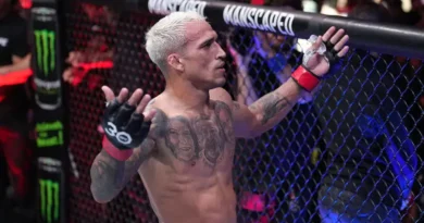 Charles Oliveira of Brazil celebrates his TKO victory over Beneil Dariush during the UFC 289 event at Rogers Arena.