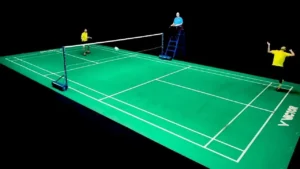 A "let" in badminton ensures fair play by allowing a rally to be replayed if it is interrupted by unexpected occurrences.