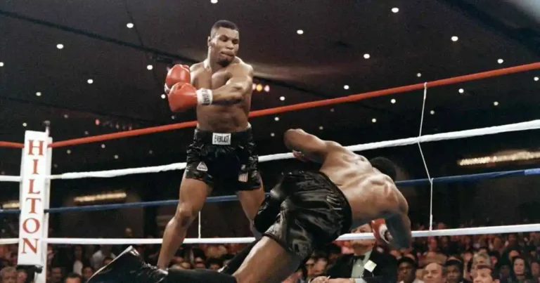 Mike Tyson knocks his opponent, heavyweight champion Trevor Berbick, to become the youngest heavyweight world champion in history on November 22, 1986 in Las Vegas.