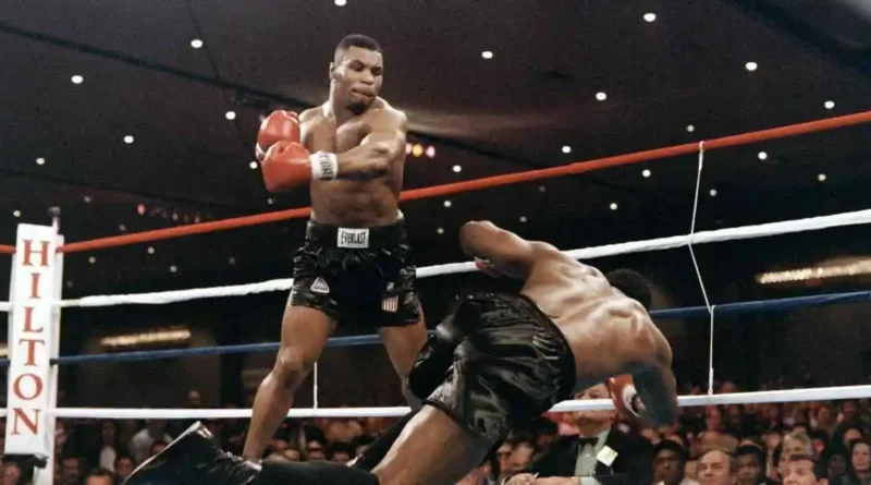Mike Tyson knocks his opponent, heavyweight champion Trevor Berbick, to become the youngest heavyweight world champion in history on November 22, 1986 in Las Vegas.