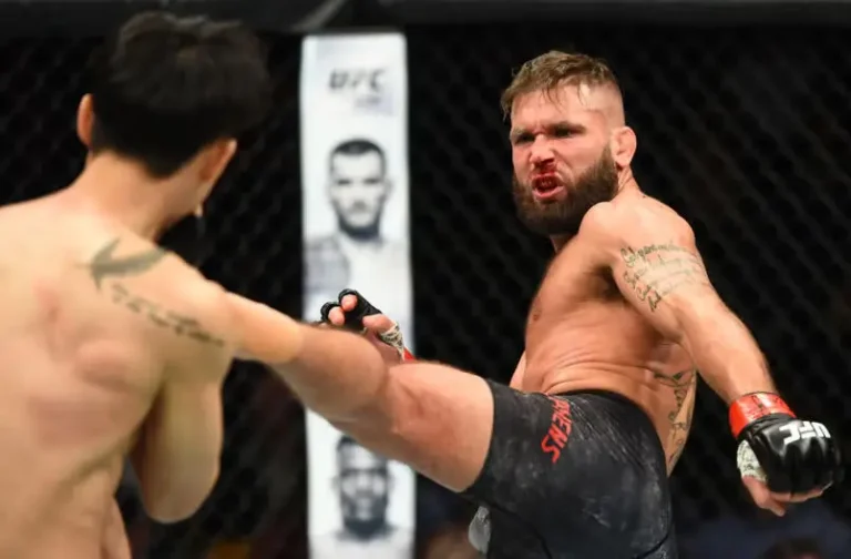 Jeremy Stephens kicks Dooho Choi of South Korea in their featherweight bout during the UFC Fight Night event inside the Scottrade Center on January 14, 2018 in St. Louis, Missouri.