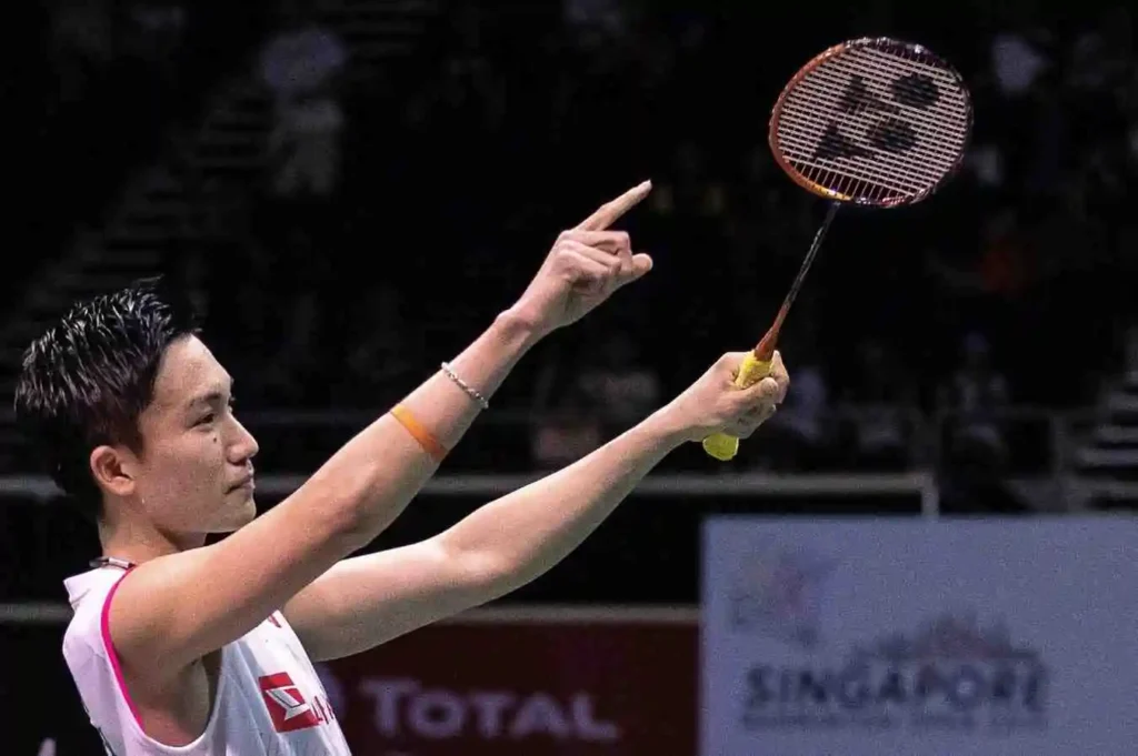 Kento Momota celebrates beating Indonesia's Anthony Sinisuka Ginting in their men's singles final match at the Singapore Open on Sunday in Singapore.