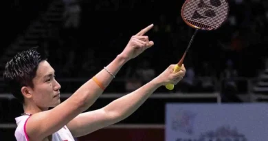 Kento Momota celebrates beating Indonesia's Anthony Sinisuka Ginting in their men's singles final match at the Singapore Open on Sunday in Singapore.
