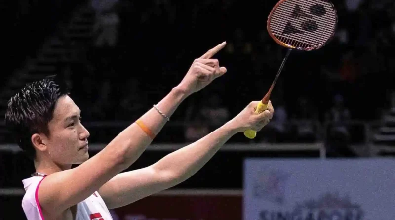 Kento Momota celebrates beating Indonesia's Anthony Sinisuka Ginting in their men's singles final match at the Singapore Open on Sunday in Singapore.