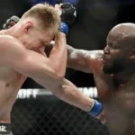 Derrick Lewis, right, punches Alexander Volkov during a heavyweight mixed martial arts bout.