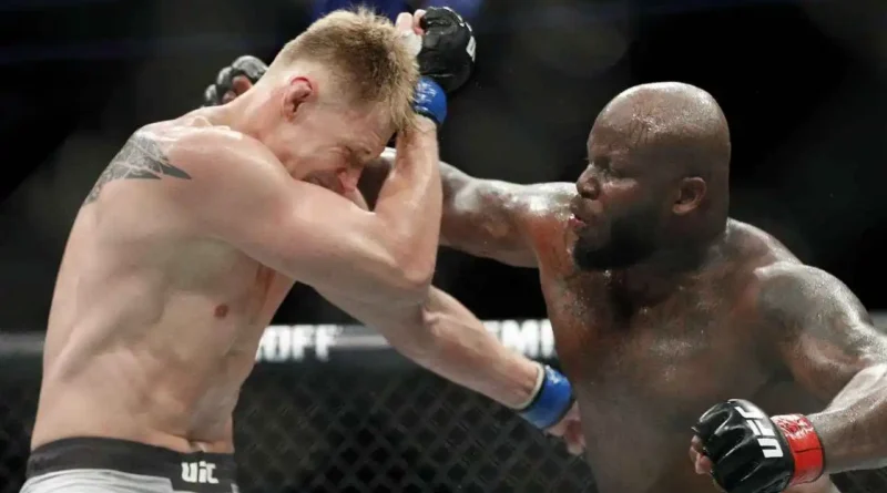 Derrick Lewis, right, punches Alexander Volkov during a heavyweight mixed martial arts bout.
