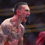 Max Holloway reacts to his knockout of Justin Gaethje in the BMF championship fight during the UFC 300 event at T-Mobile Arena on April 13, 2024 in Las Vegas, Nevada.