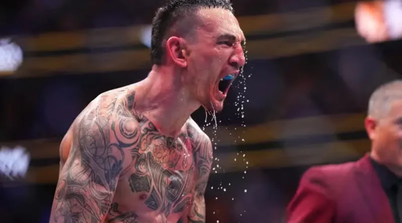 Max Holloway reacts to his knockout of Justin Gaethje in the BMF championship fight during the UFC 300 event at T-Mobile Arena on April 13, 2024 in Las Vegas, Nevada.