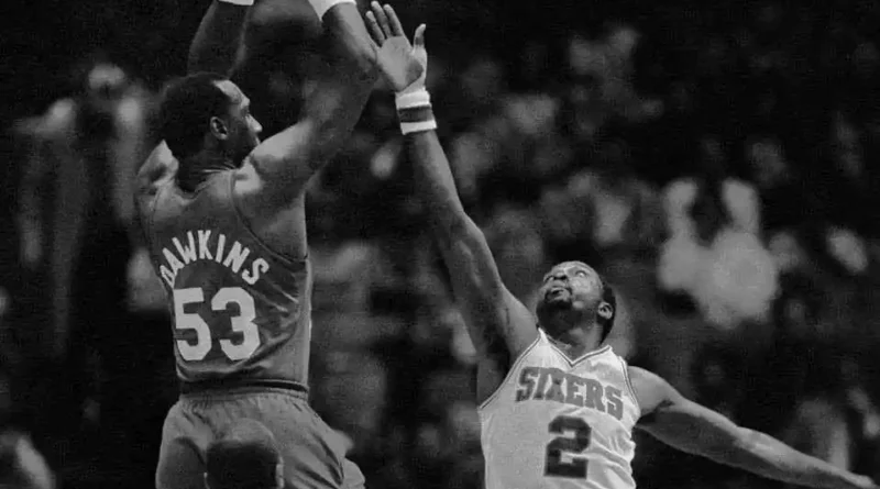 Moses Malone, right, defends Darryl Dawkins in this April 20, 1984, photo. Malone, an NBA Hall of Famer and three-time MVP, died Sunday at age 60. Two weeks ago, Dawkins died at 58.