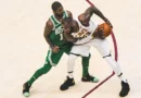 James protects the ball from Kyrie Irving in October 2017. The two were teammates in Cleveland for three seasons.