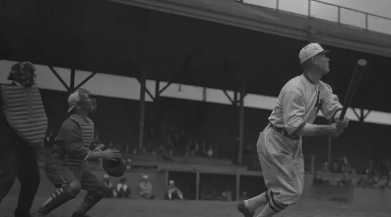 Baseball player Sam Crawford after hitting a ball, Los Angeles, circa 1920 (cropped).