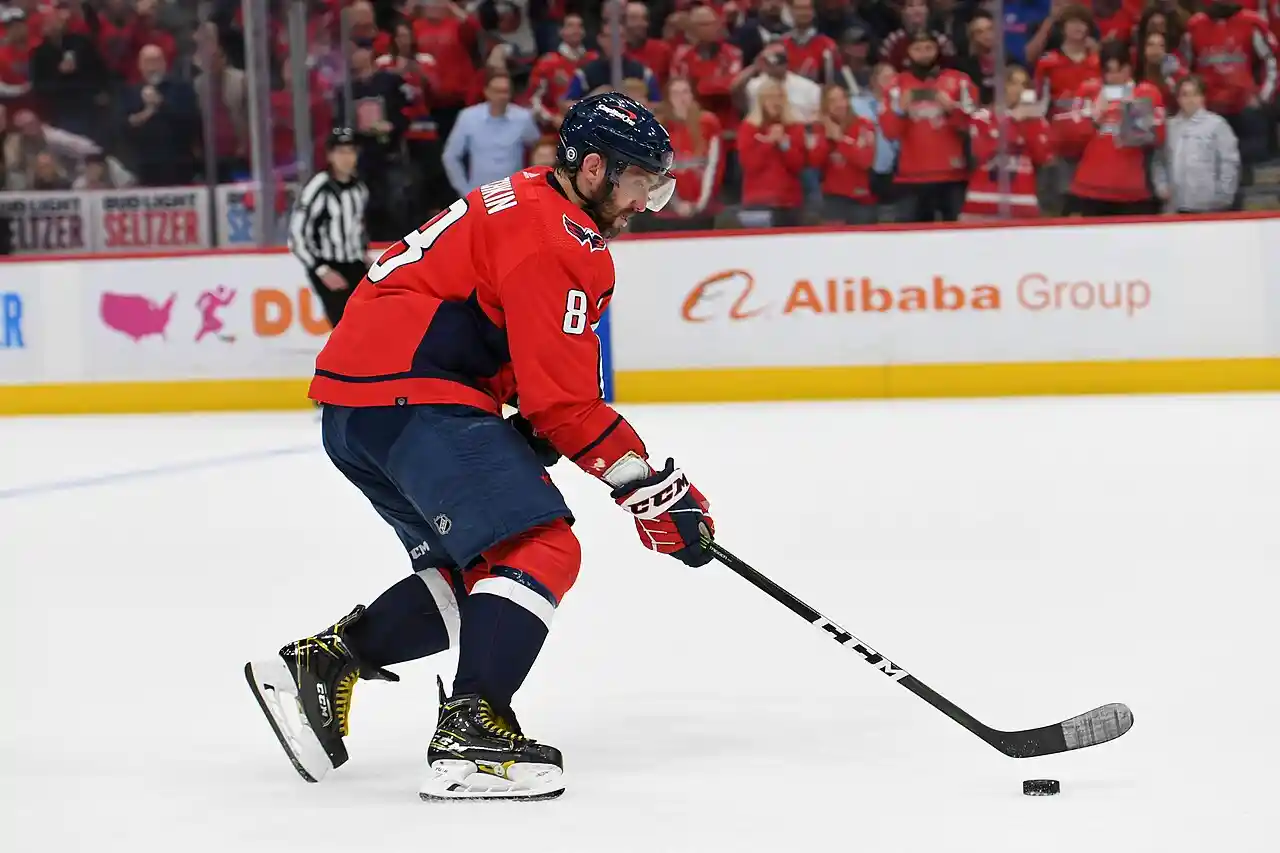 Washington Capitals Left Wing Alex Ovechkin (8) skating with puck during the shootout against the New York Islanders at Capital One Arena in Washington D.C., March 15, 2022.