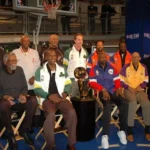 (Top) NBA legends Julius "Dr. J" Erving, Clyde Drexler, George Gervin, Dave Cowens, Walt "Clyde" Frazier, Earl Monroe, (Bottom) Bill Russell, Robert Parish, Moses Malone & Kareem Abdul-Jabbar pose w/ the Larry O'Brien NBA Championship Trophy in 2005.