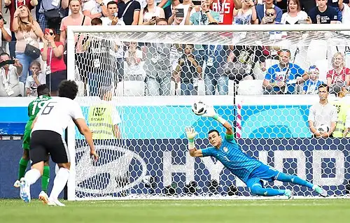 El Hadary saving a penalty shot from Saudi Arabia's Fahad Al-Muwallad at the 2018 FIFA World Cup.