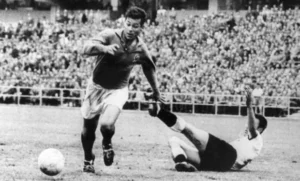Just Fontaine playing for France at the 1958 FIFA World Cup.