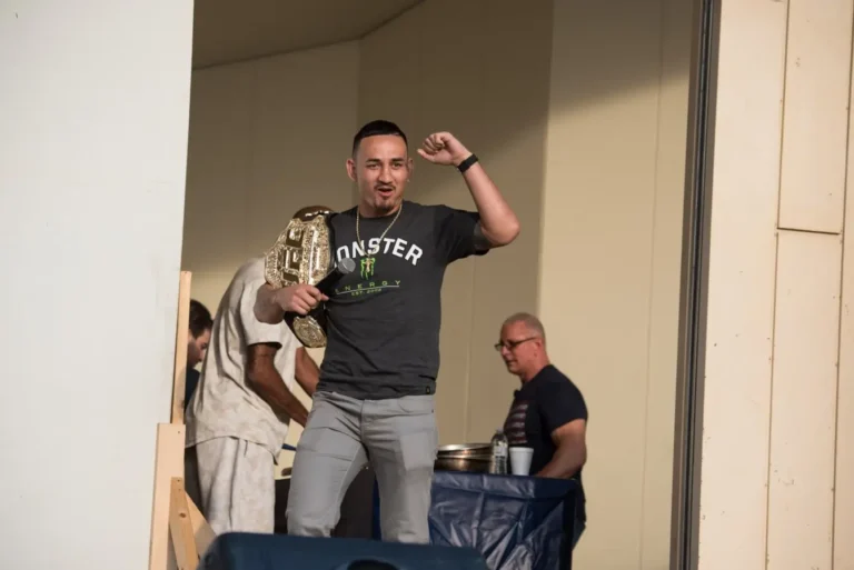 UFC Featherweight Champion Max Holloway performs a USO variety show at Yokota Air Base, Japan